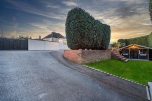 REAR DRIVEWAY- click for photo gallery